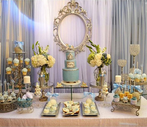 dessert table with cake and cupcakes