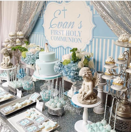 dessert table with cake and cupcake