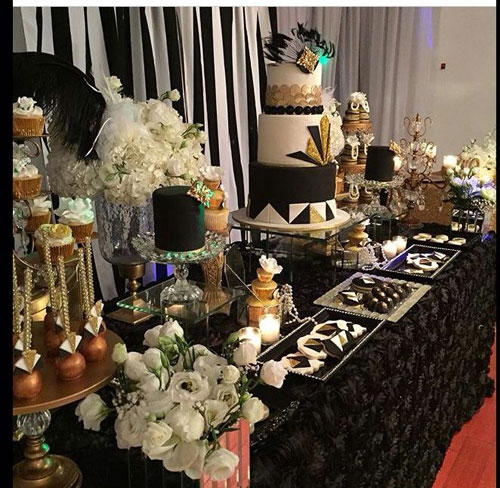 dessert table with cake and cupcake