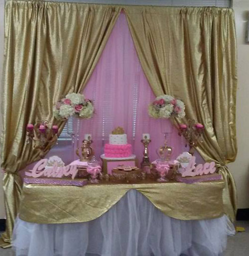 dessert table with cake and cupcake