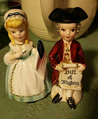 Colonial couple salt and pepper shakers