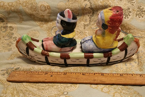 vintage Indians in canoe salt and pepper shakers
