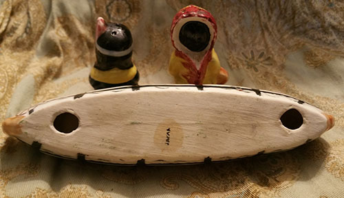 vintage Indians in canoe salt and pepper shakers