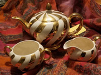 Elegant white/ gold swirl tea set. Marked Ellgreave Burslem England