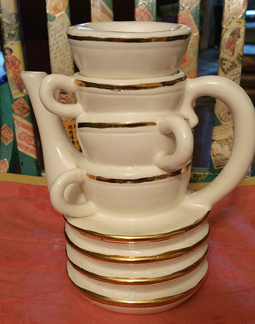 stack of teacups teapot