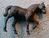 Vintage die-cast metal horse. 