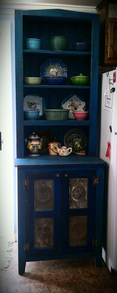 blue rustic cabinet punched tin doors