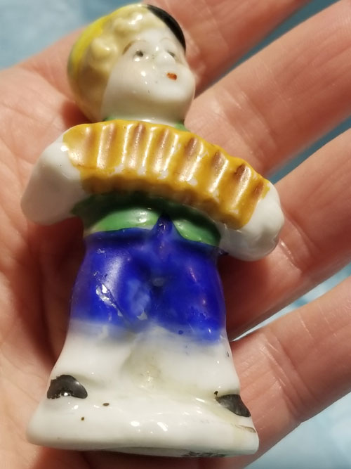 Cute little accordion boy figurine. Occupied Japan. 