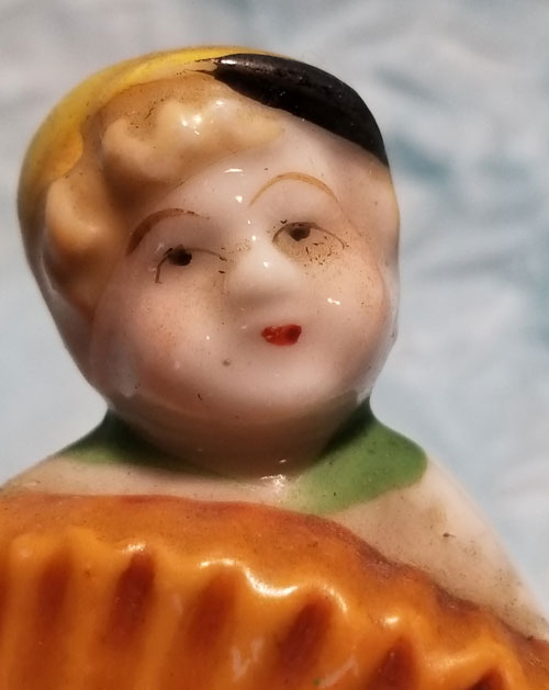 Cute little accordion boy figurine. Occupied Japan. 