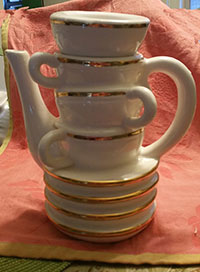 stack of teacups teapot