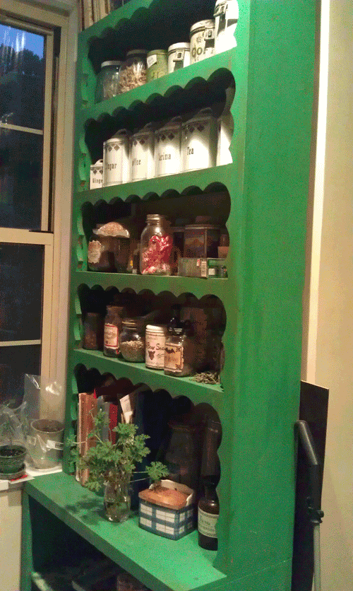 Green scalloped cabinet